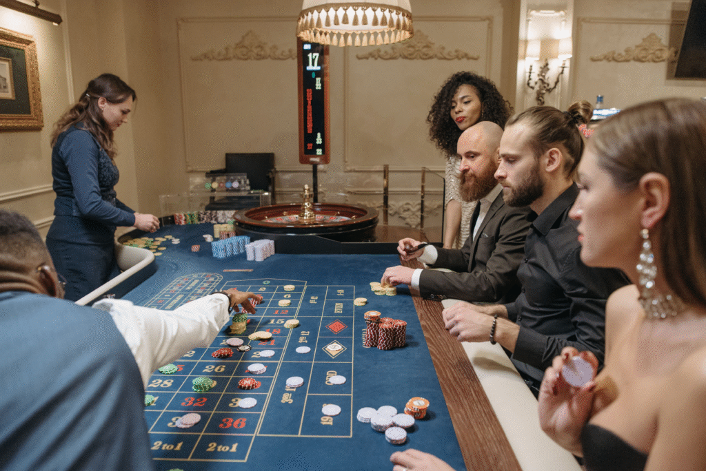 Players enjoy the excitement of roulette while socializing at an upscale casino night event in New York.